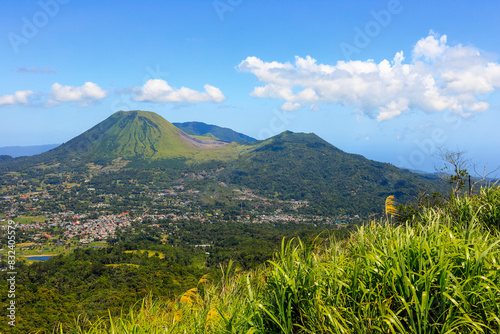 Mounts Lokon on the left, and Empung, with Tompaluan active crater on the saddle between, two volcanoes near Tomohon city, Gunung Lokon, Tomohon, North Sulawesi, Indonesia photo