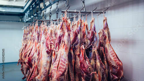 Meat from cattle, slaughterhouse, butcher's factory food intended for consumption and for food chains. Edit space photo