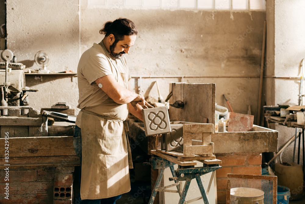 Diabetic Craftsman Places Barcelona Panot Tile on Drying Rack in Workshop
