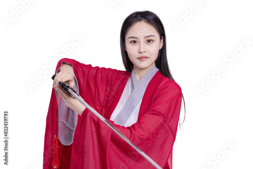 An oriental beauty in a red costume holds a sword
