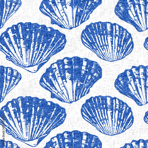 Azure blue white shell motif with linen seamless batik background. Modern coastal beach cottage rustic shell block print home decor pattern design in sealife beach style. 