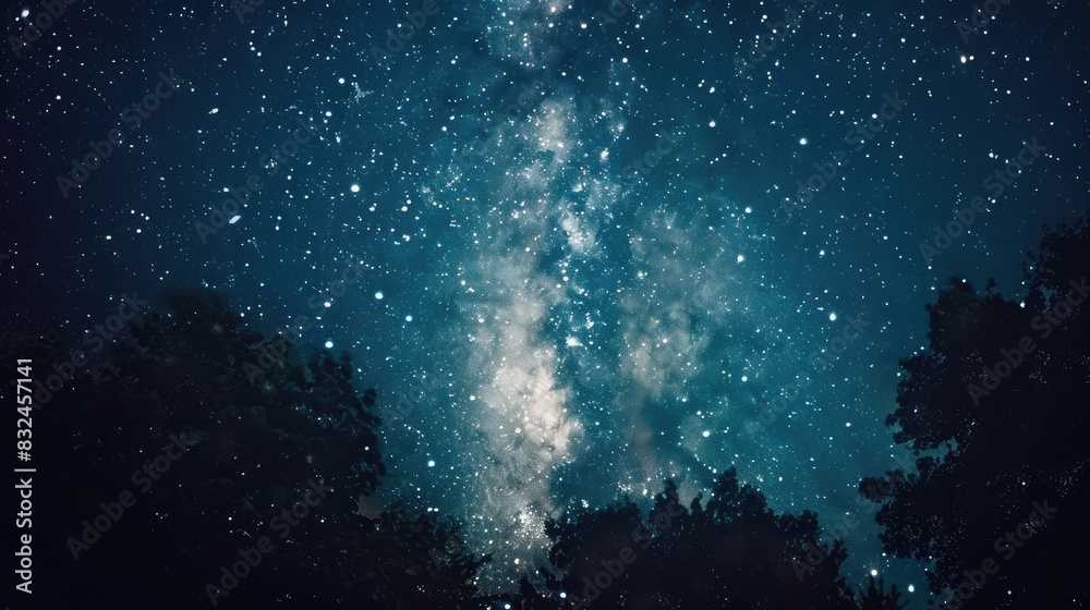 A peaceful night sky with a visible Milky Way and countless stars, creating a sense of awe and wonder A peaceful night sky with a visible Milky Way and countless stars, creating a sense of awe and wonder