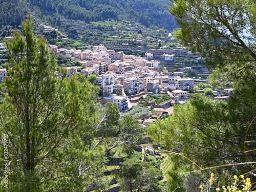 View of a village leaning on the slope of a mountain in Mallorca island