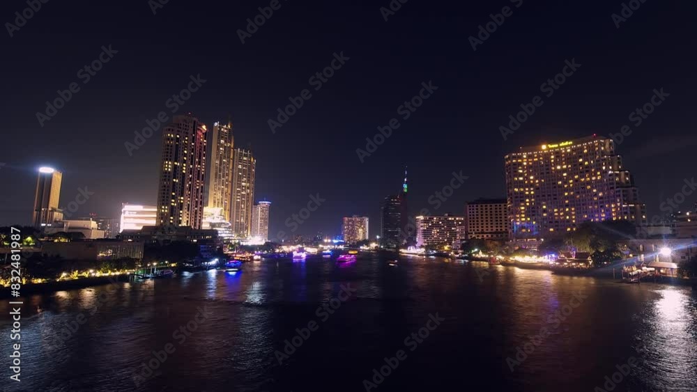 Bangkok, Thailand - 1st january, 2024: cruise tour boats with neon lights on famous chao phraya river sightseeing tour in capital Thailands city. Famous Siam city at night Bangkok, Thailand - 1st january, 2024: cruise tour boats with neon lights on famous chao phraya river sightseeing tour in capital Thailands city. Famous Siam city at night