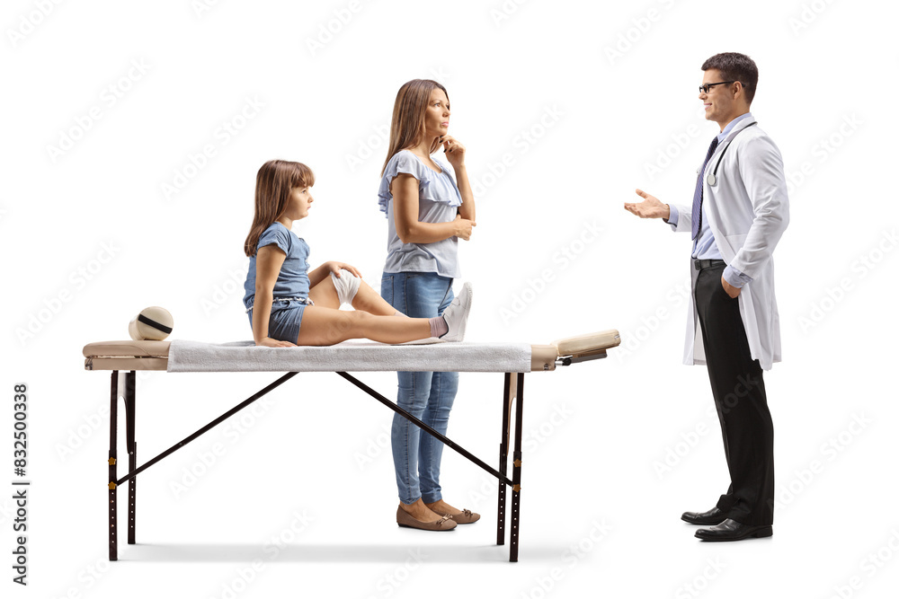 Obraz premium Mother and kid with a broken arm talking to a doctor, arm injury concept