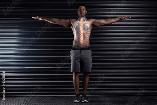 фотографія Man, athlete and muscle body with spine, pain and posture or wellness injury and health with arms stretched