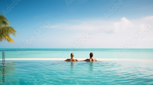 vacation, couple on the beach near swimming pool, luxury travel 