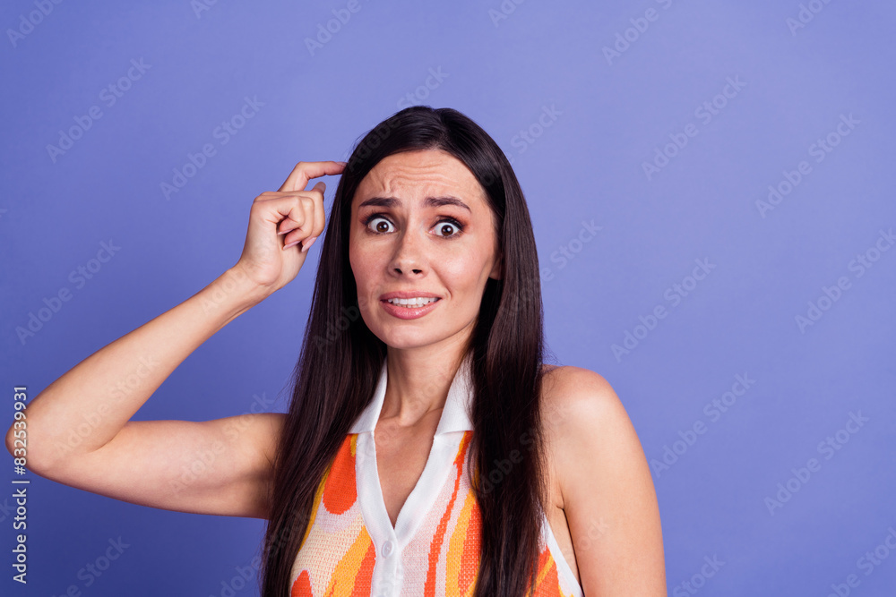 Portrait of nice lady scratch head empty space wear dress isolated on purple color background Portrait of nice lady scratch head empty space wear dress isolated on purple color background