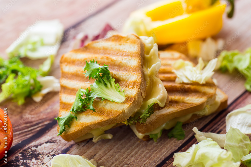 fried toasts with filling, salad leaves, tomatoes fried toasts with filling, salad leaves, tomatoes