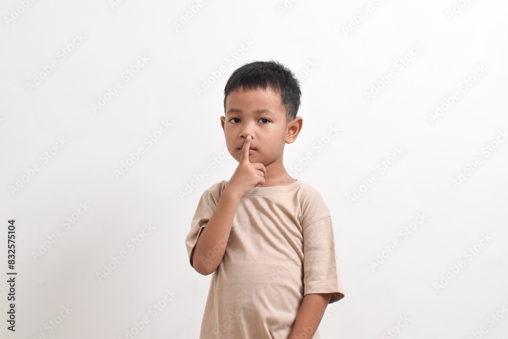 Image of Asian child posing on white background. portrait of an asian boy Image of Asian child posing on white background. portrait of an asian boy