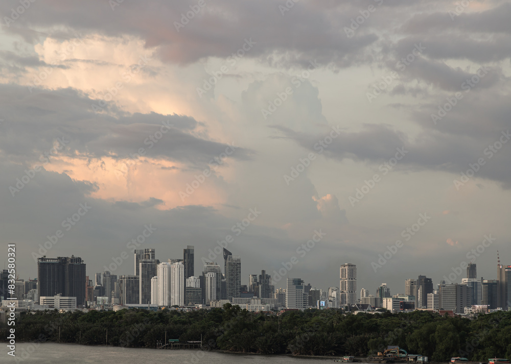 Beautiful Clouds in the Sky over Large Metropolitan City of Bangkok. View of Skyscrapers and Dramatic Sky before Sunset, Copy space, Selective focus.
