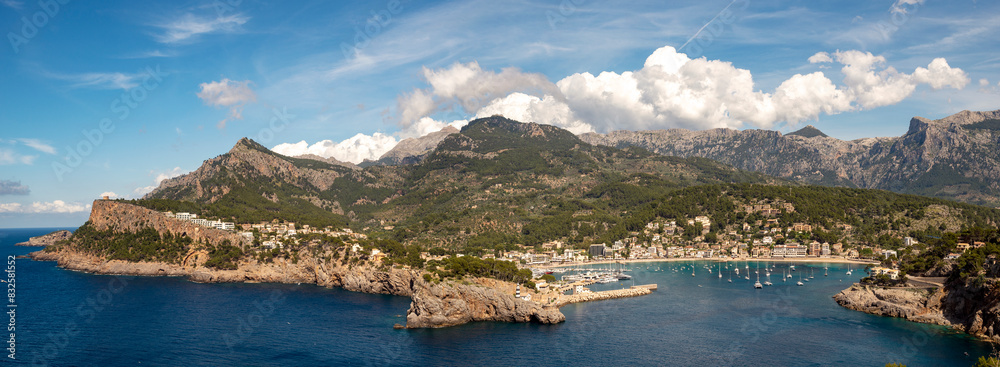 Panoramic view of Port de Sóller coastal town in Sierra de Tramontana mountains, northwest of Mallorca, Balearic Islands, Spain Panoramic view of Port de Sóller coastal town in Sierra de Tramontana mountains, northwest of Mallorca, Balearic Islands, Spain