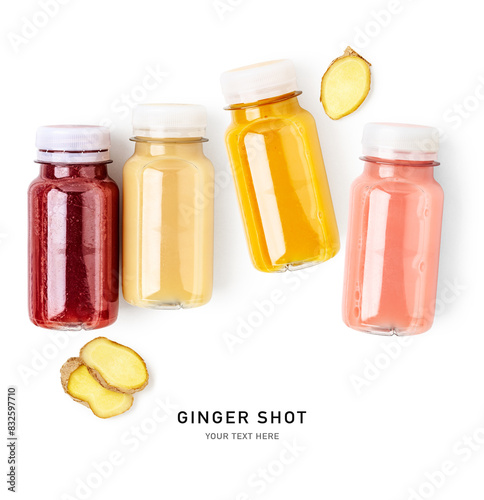 Fresh ginger shot bottles set isolated on white background. photo