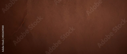 Close-up texture of reddish-brown surface with rugged and cracked patterns