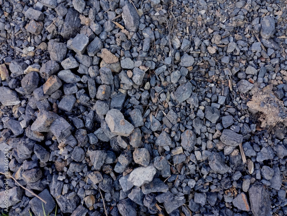 Texture of black stone coal poured on a pile. Industry and coal mining. Natural resources and fossil minerals. Texture of black stone coal poured on a pile. Industry and coal mining. Natural resources and fossil minerals.