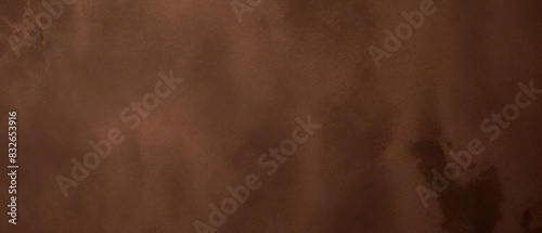 Close-up texture of reddish-brown surface with rugged and cracked patterns