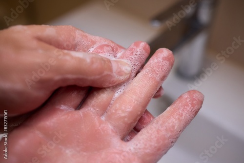 Wallpaper Mural An automatic hand soap dispenser creates foam, promoting hygiene and cleanliness Torontodigital.ca