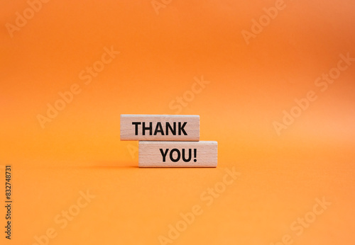 Start now symbol. Wooden blocks with words Start now. Beautiful orange background. Business and Start now concept. Copy space.