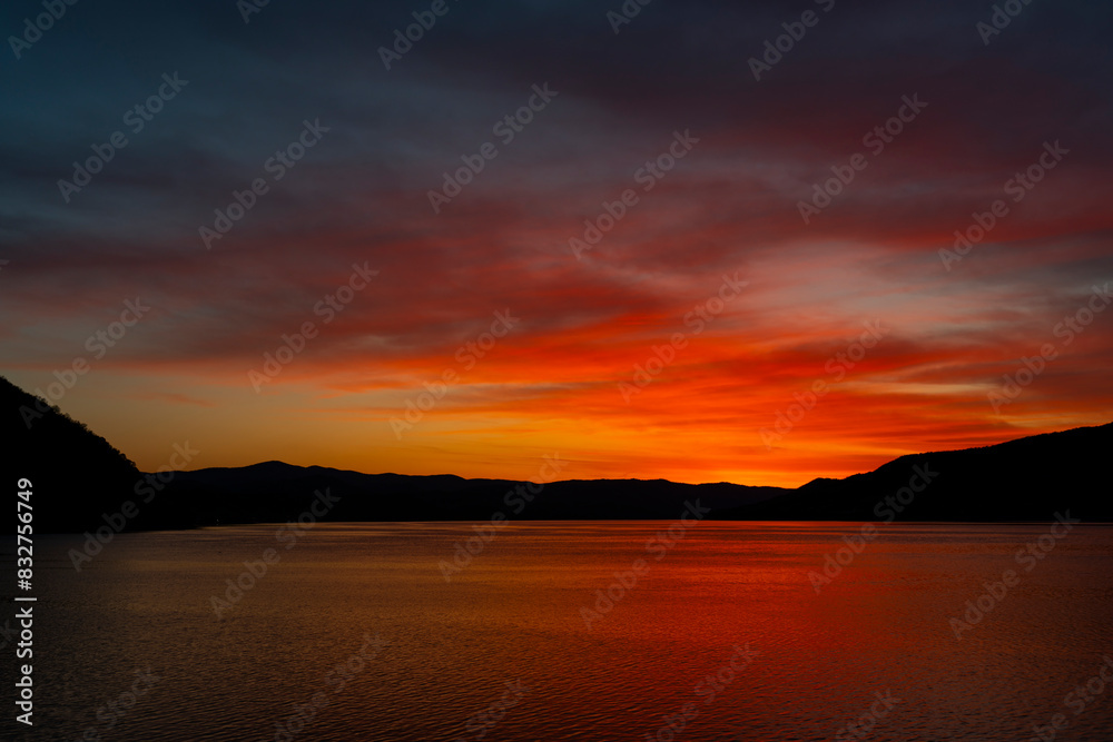 Breathtaking sunset over Djerdap gorge on the Danube river in Serbia Breathtaking sunset over Djerdap gorge on the Danube river in Serbia