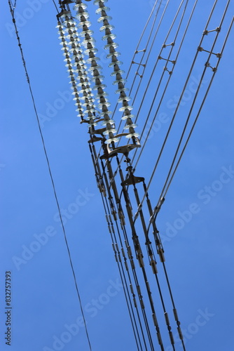 Power line details in extreme close-ups against a clear blue sky. Perfect illustrations for most things in the energy field.