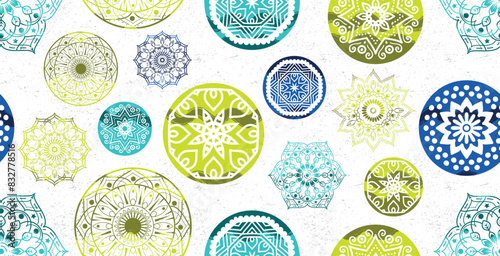 Beautiful green and blue mandala seamless pattern with white background