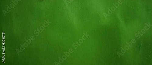 Dunkelgrüner Hintergrund oder Textur mit Sprühfarbe. Grüner Grunge-Hintergrund und abstrakte dunkelgrüne Materialtextur-Hintergründe. photo