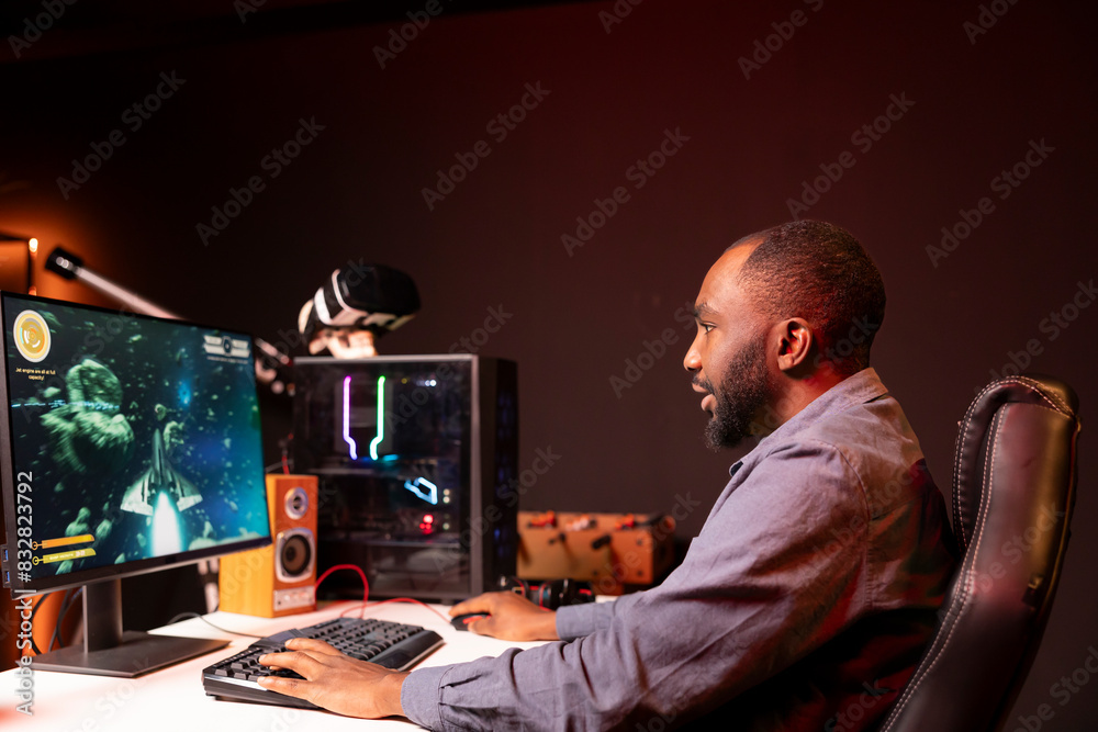 Man at home shooting asteroids in spaceship flying singleplayer game with overlay HUD showing health, fuel, ammo bars and minimap. Gamer navigating universe in simulation game, having fun Man at home shooting asteroids in spaceship flying singleplayer game with overlay HUD showing health, fuel, ammo bars and minimap. Gamer navigating universe in simulation game, having fun