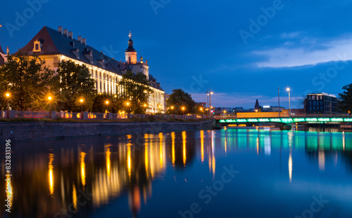Twilight over riverside european cityscape
