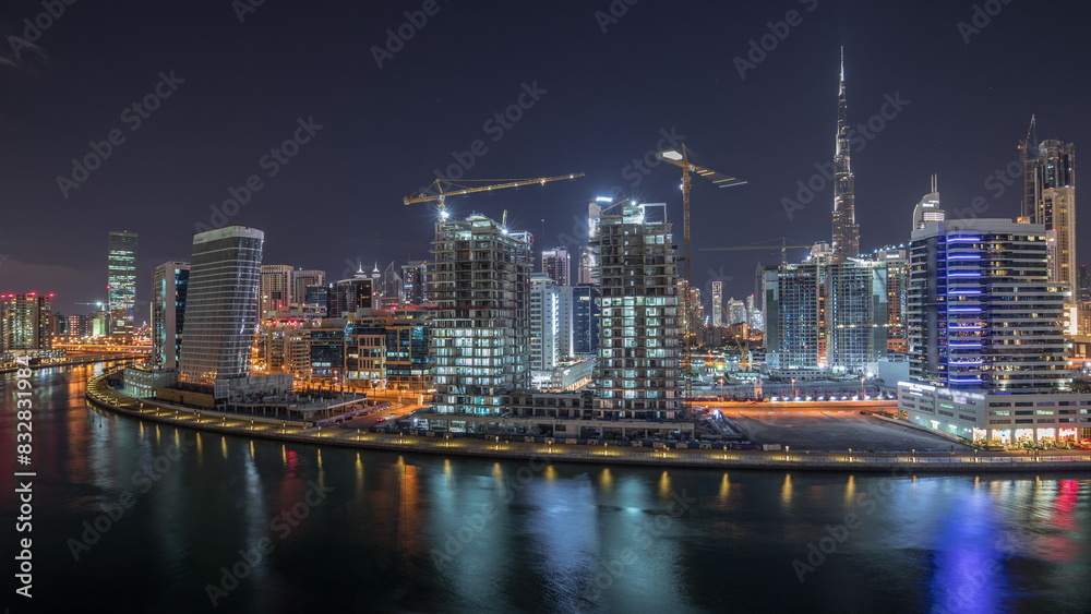 Dubai skyline at night with illuminated skyscrapers