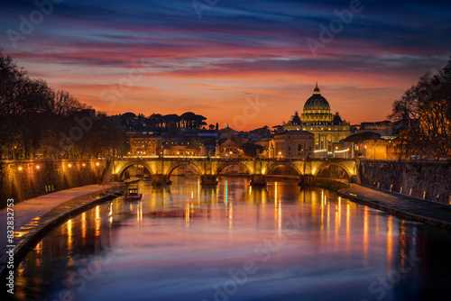 Twilight over vatican city and tiber river photo