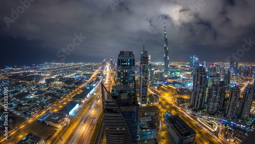 Majestic nighttime cityscape with illuminated skyscrapers
