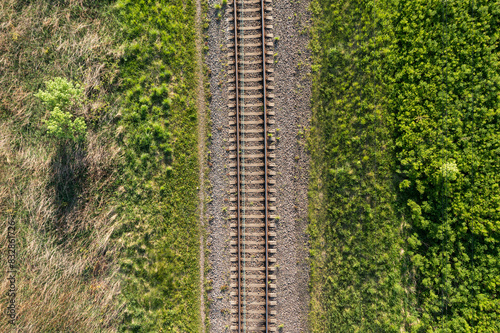 Railway through summer forest. Aerial view