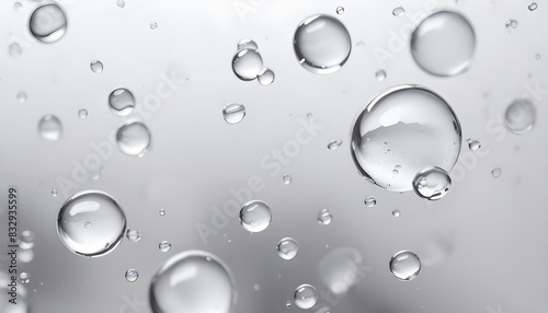 Blurred white and gray background with water drops