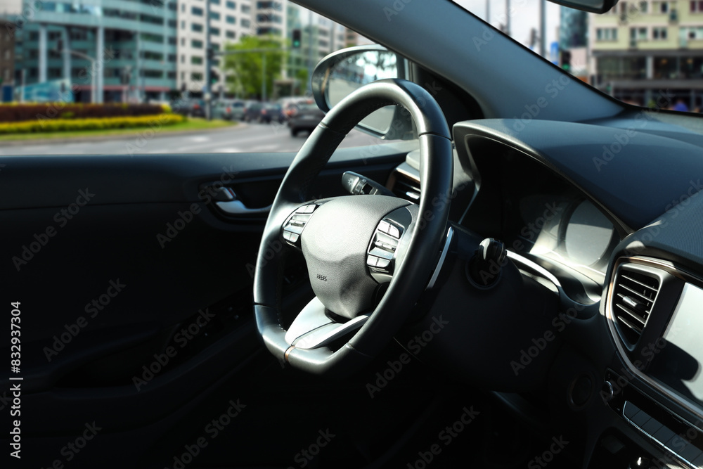 Steering wheel and dashboard in modern car Steering wheel and dashboard in modern car