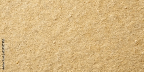 Rough natural beige paper texture with a gritty surface
