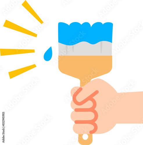 塗料を含んだ刷毛を握る手
