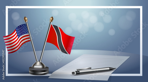 USA and Trinidad and Tobago Small national flag on bokeh background, cooperative relationship