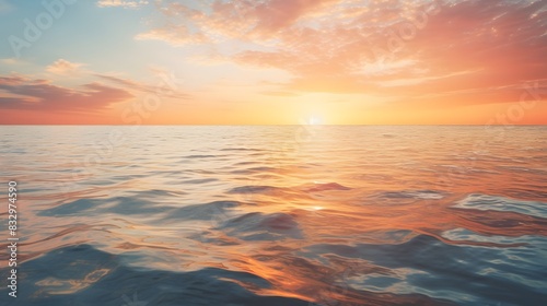 Serene Ocean at Sunset with Golden Light Reflecting on Calm Waters