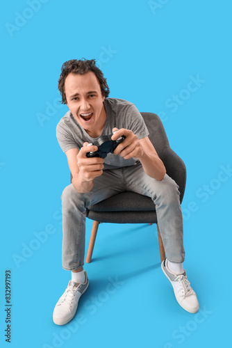 Young man playing video gam...