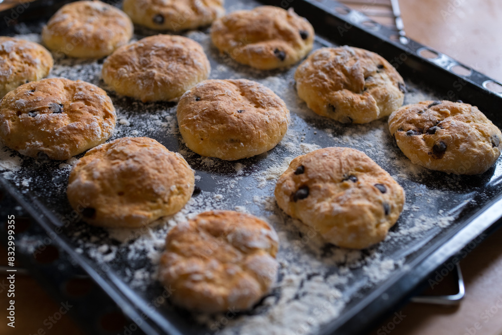 Homemade baking.Cookies with chocolate pieces in a baking tray. Homemade baking.Cookies with chocolate pieces in a baking tray.