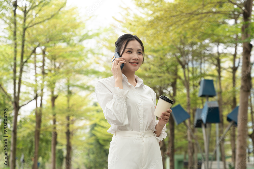 Portrait of young Asian businesswoman in the park Portrait of young Asian businesswoman in the park