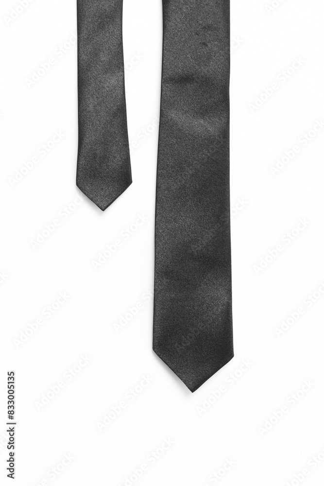 black necktie isolated on white background, father day concept and business style black necktie isolated on white background, father day concept and business style
