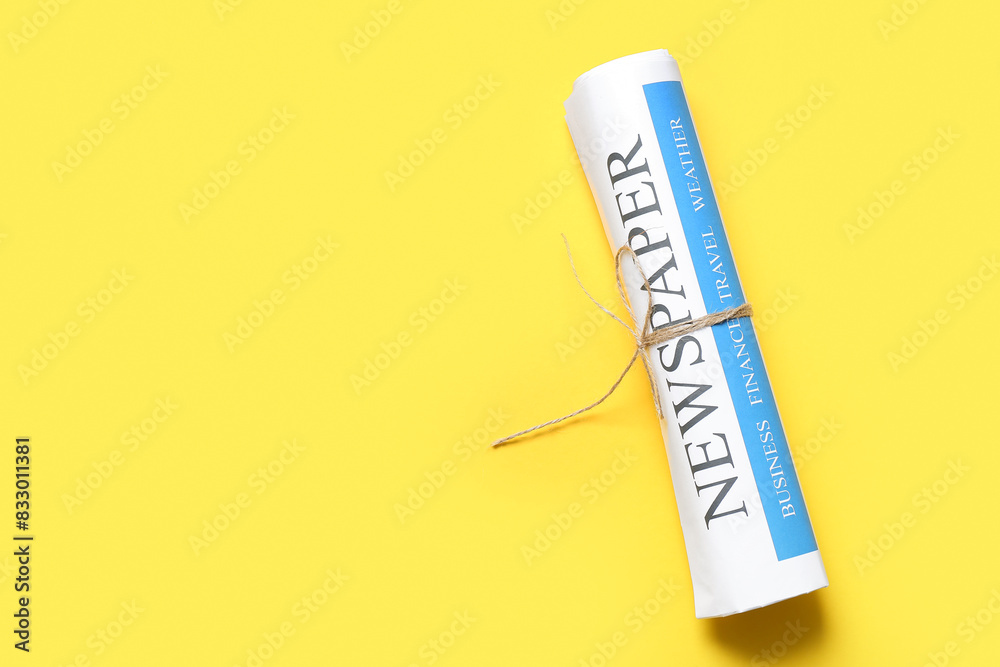 Newspaper on yellow background