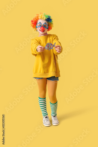 Funny little girl in disgui...