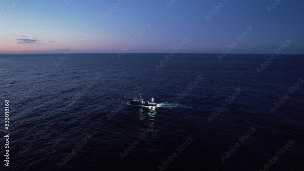 tuna fishing boat fishing at night in the atlantic ocean, azores. tuna fishing boat fishing at night in the atlantic ocean, azores.
