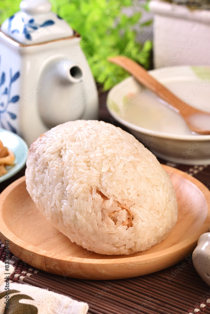 Taiwanese rice ball are made from glutinous rice and usually come with fried bread stick, pickled radish, pickled mustard greens and braised eggs. Taiwanese rice ball are made from glutinous rice and usually come with fried bread stick, pickled radish, pickled mustard greens and braised eggs.
