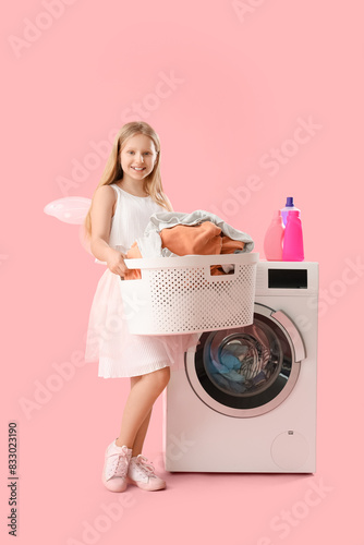 Girl in fairy costume with ...