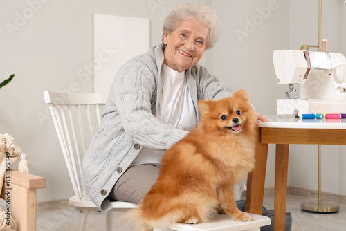 Senior woman with Pomerania...