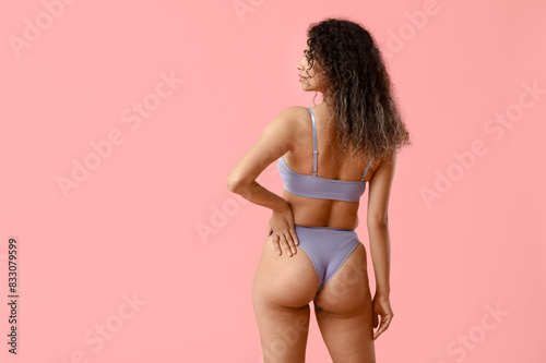 Young woman in lavender und...
