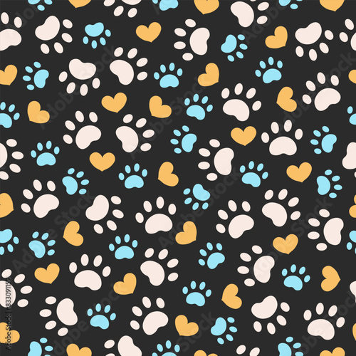 Paw animal print silhouettes. Seamless pattern with paws